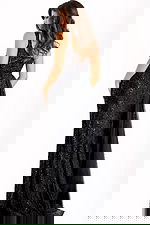 Black sequin gown with sheer bodice and draped chiffon overlay.