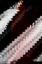 Feather embellished gown with sequin detailing and sheer cape