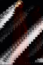 Elegant full-length sequin gown with feathered shoulders