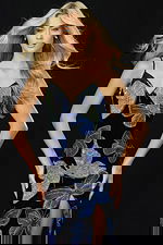 Front view of velvet gown with shimmering butterfly embellishments