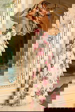 Off-white A-line gown featuring layered beaded flowers