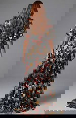 Floral V neck gown with puff sleeves and flowing silhouette