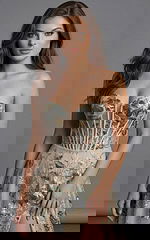 Long evening gown with floral embroidery, fitted bodice, and front slit silhouette