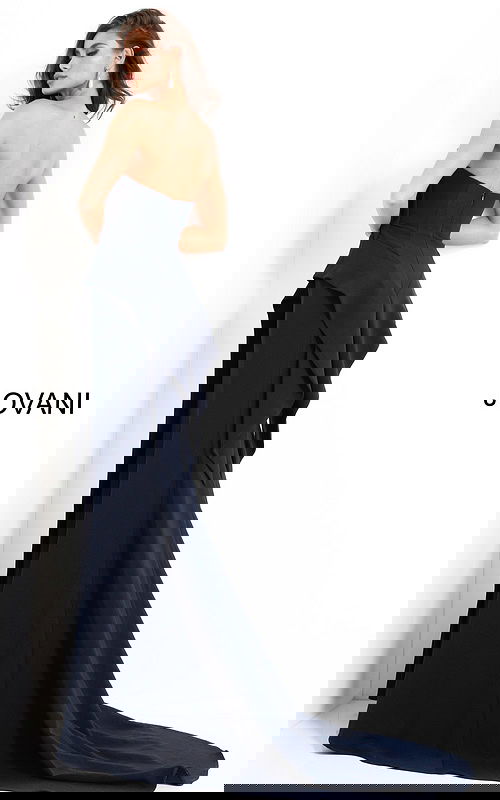 Back view of model wearing Jovani 4466 navy dress showcasing cascading ruffle details.