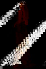 Floral embroidered gown with deep V neckline and flowing A-line skirt