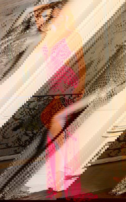 Close-up of plunging neckline with silver beading and fringe