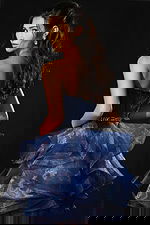 Back view of strapless organza dress with ruffled skirt and fitted bodice