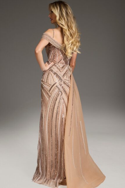 Back view of model wearing Jovani 44843, showcasing intricate beadwork and a graceful drape.