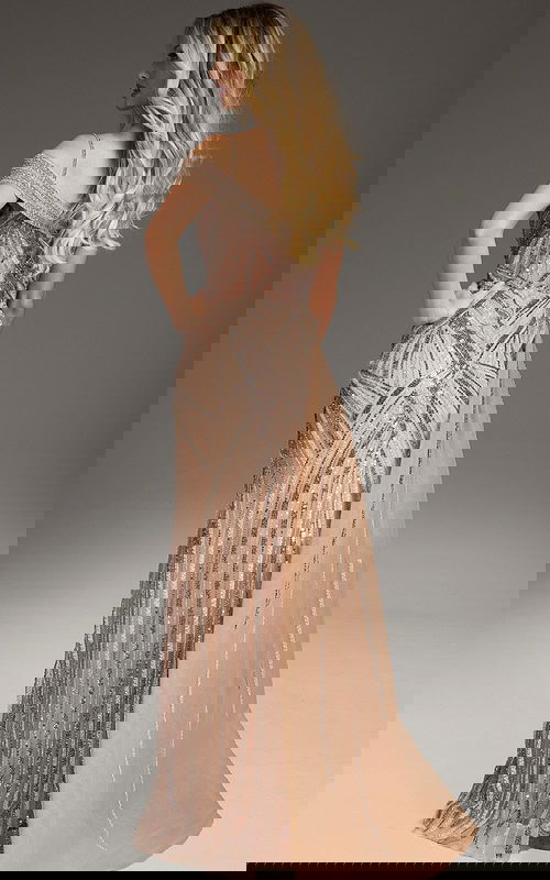 Back view of model wearing Jovani 44843, showcasing intricate beadwork and a graceful drape.