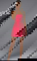 Front view of strapless fitted dress with floral beading and clean structured skirt