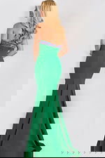 Fitted mermaid green evening dress with beaded trim