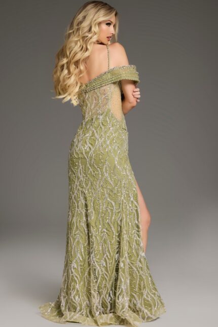 Back view of model in Jovani 45072 green gown with intricate embellishments.