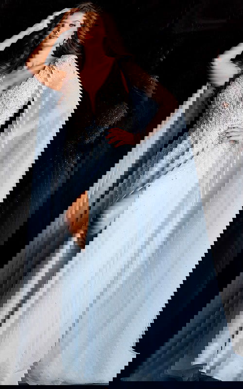 Glamorous beaded evening gown with illusion bodice and long draped cape