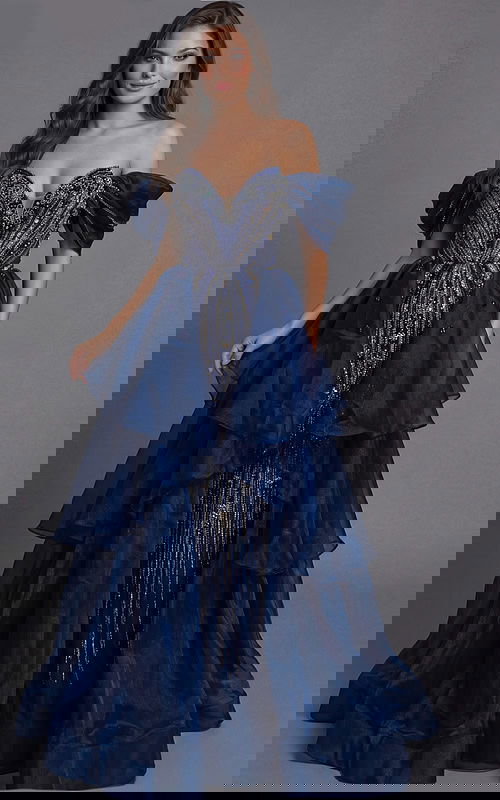 Jovani 45076 navy blue off-the-shoulder ball gown with crystal and silver beaded bodice, puff sleeves, deep sweetheart neckline, and tiered layered organza skirt with beaded center panel.