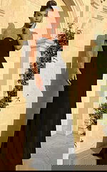 Front view of fitted gown with sheer beaded sleeves, sweetheart neckline, and sleek minimalist silhouette