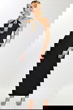 Model wearing a fitted black halter gown with crystal-embellished keyhole neckline 45106