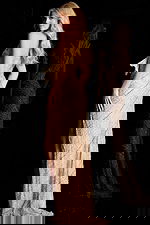 Off shoulder beaded gown with ruched bodice and side slit