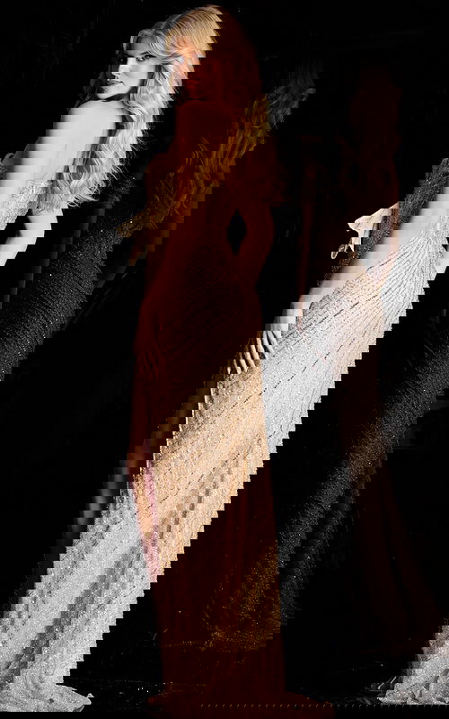 Off shoulder beaded gown with ruched bodice and side slit