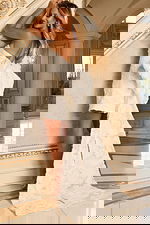 Sculptural bow mini dresses with detachable train detail