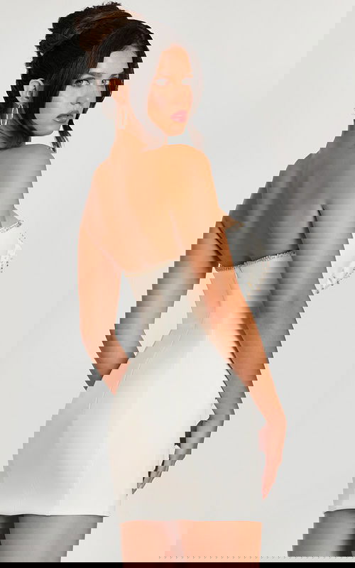 Back view of off-white strapless bodycon dress