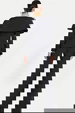 Elegant Black Power Suit Featuring 3D Floral Accent and Flared Pants