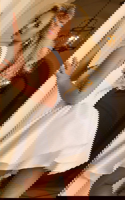 Fit-and-flare mini dress with wide straps and flared skirt