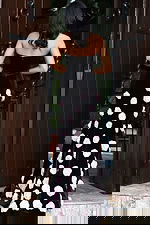 Black strapless gown with pink rose embellishments