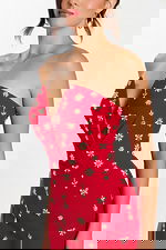 Close-Up of Red Dress with Beaded Butterfly and Floral Motifs