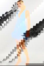 Back View of Sleeveless Blue Dress with Feather Trim