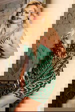 Sequin mini dress with plunging neckline and leaf details