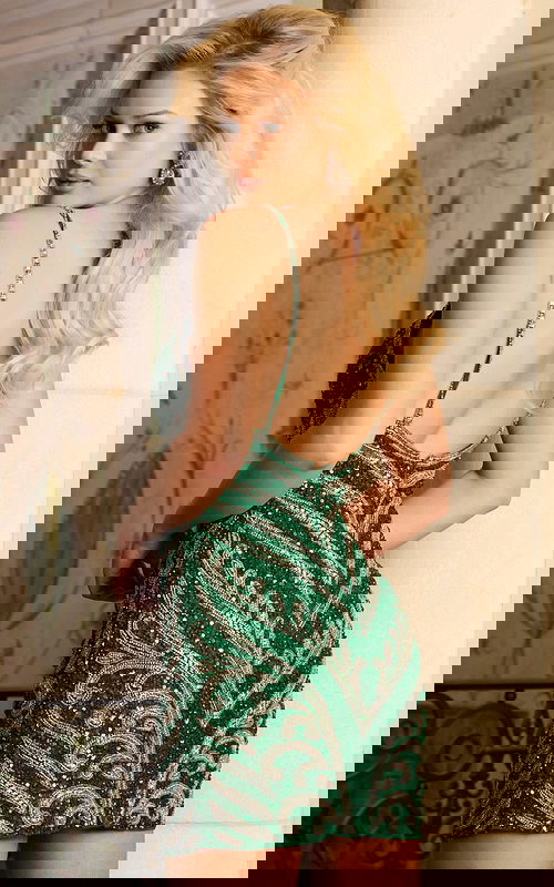 Open back short dress with silver and green beadwork