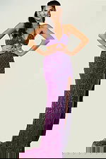 Elegant fitted beaded gown with open back and halter neckline