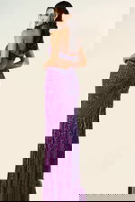 Beaded halter gown with high slit and cutout bodice