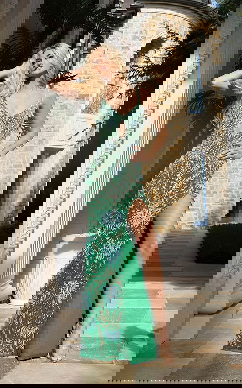 Elegant open-back prom dress with shimmering beadwork