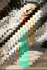 Fitted sequin gown with V-neckline and keyhole front cutout