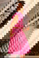 Shiny pink short dress with cutout bodice and twirl-ready skirt