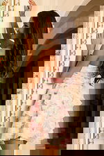 Tiered ruffle dress with floral design and sweetheart neckline