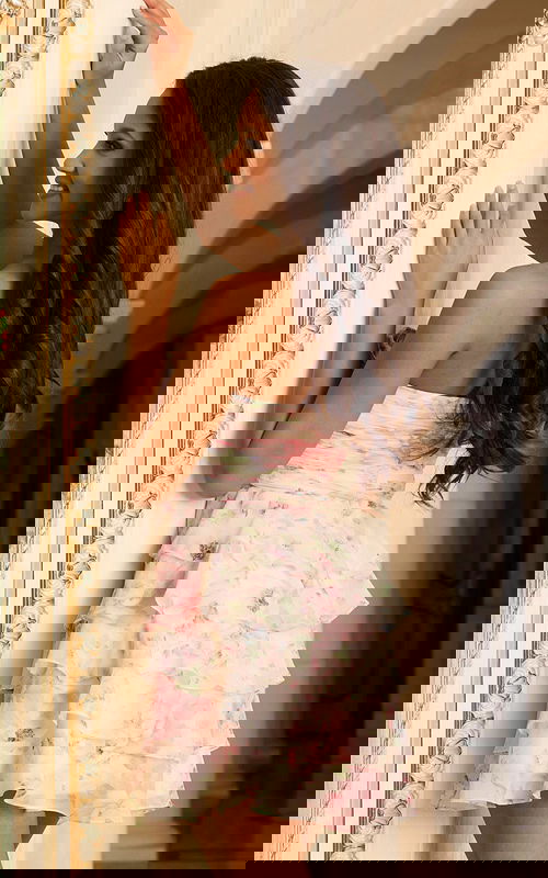 Tiered ruffle dress with floral design and sweetheart neckline