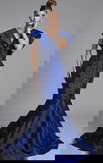 beaded mermaid gown with deep V neckline and sculpted collar