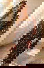 Strapless black lace evening dress with sheer shawl and fitted silhouette