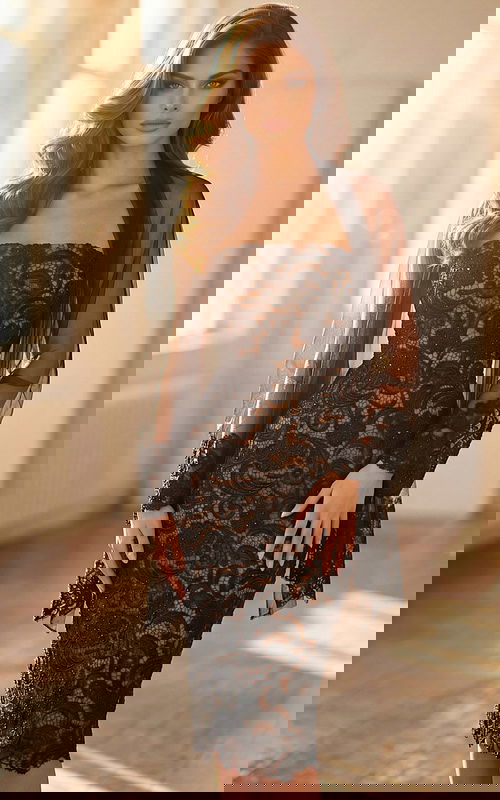 Strapless black lace evening dress with sheer shawl and fitted silhouette