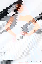 Elegant white satin dress featuring statement flower collar and fitted bodice