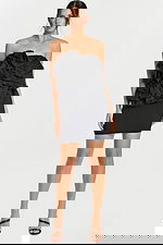 Strapless black mini dress with dramatic ruffled bodice front view