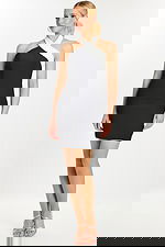 Fitted black mini dress with white halter neck front view