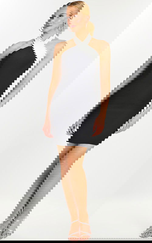 Fitted black mini dress with white halter neck front view