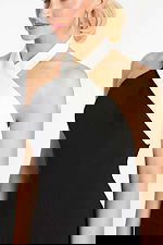 Close-up of white crossover neckline on mini dress