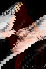 Sheer tulle mini dress with ruffled cape overlay