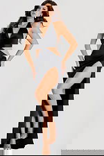 Elegant cutout evening gown with draped bodice and floor-length skirt