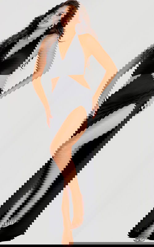 Elegant cutout evening gown with draped bodice and floor-length skirt