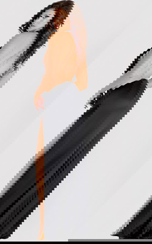 Black satin gown with halter neckline and high leg slit